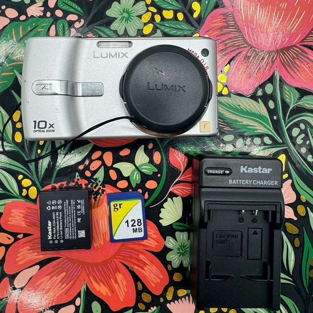Panasonic Lumix DMC-TZ1 Silver Digital Camera 10x Optical Zoom Leica Lens Bundle